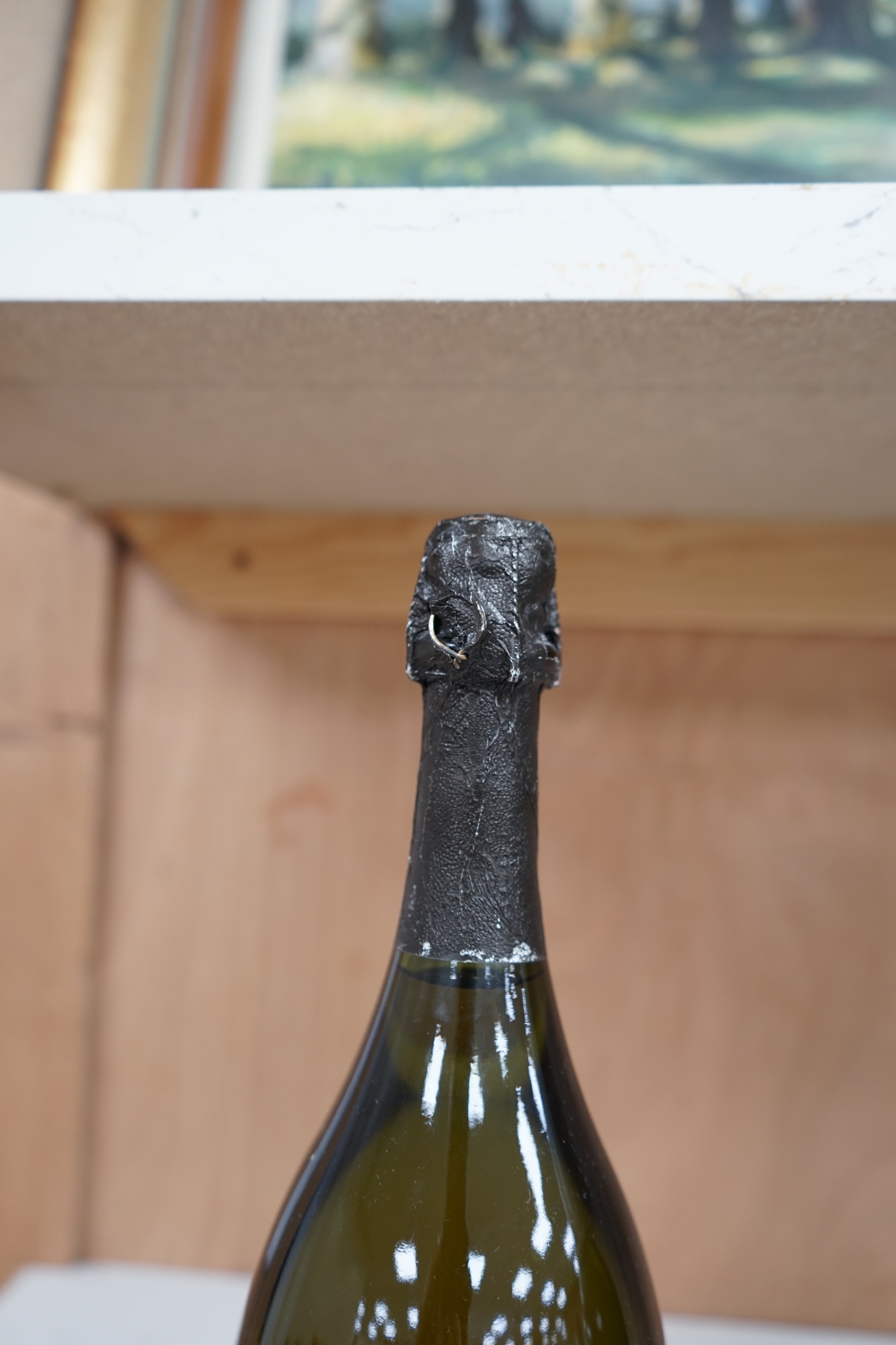 A 2003 vintage bottle of Dom Perignon champagne. Condition - fair to good, minor label wear, etc.